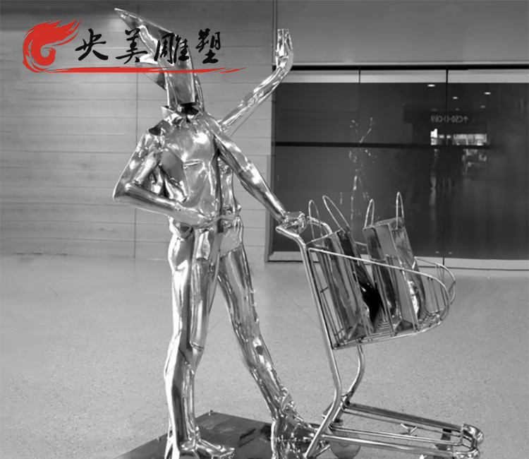 商場(chǎng)擺放不銹鋼抽象購物人雕塑圖片